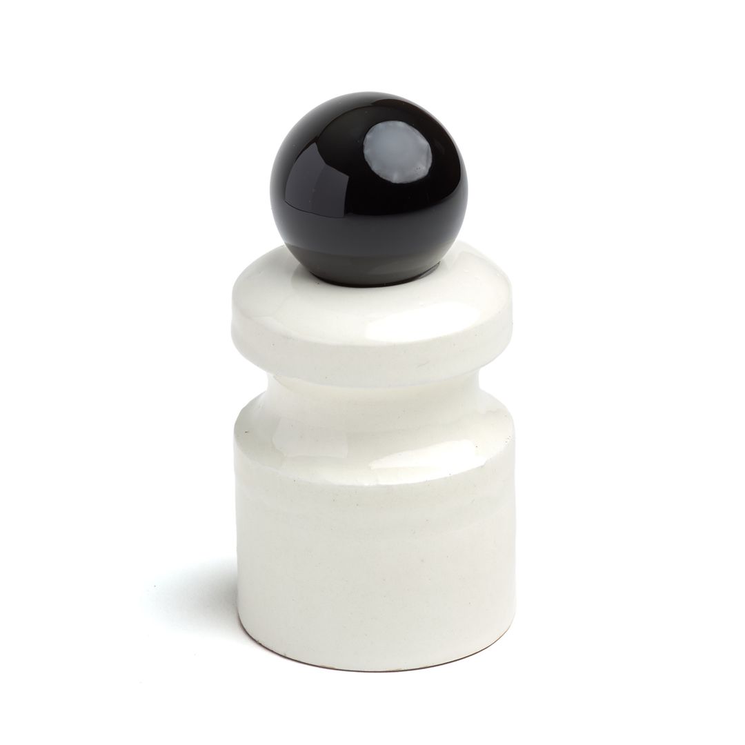 Caledonian Pear ceramic vessel seen from above, the glass orb resting on the glazed form.